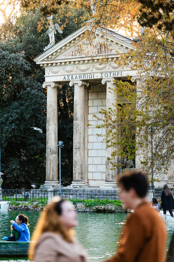 Couple in Villa Borghese with the Asclepius Temple in the background