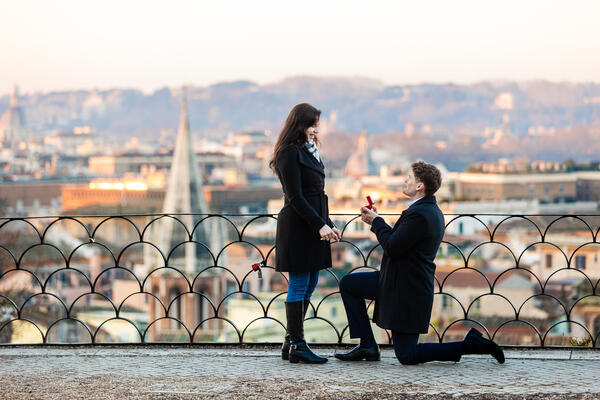 Surprise wedding proposal at sunrise on the Terrazza Belvedere on the Pincian Hill in the Eternal City