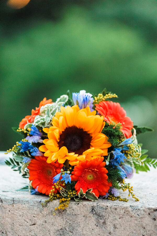 Proposal bouquet of flowers sitting on marble in Rome