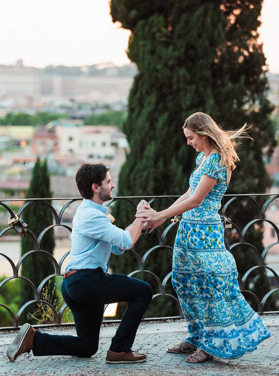 Sunset surprise proposal on Terrazza Belvedere in Rome with Victoria and Zach